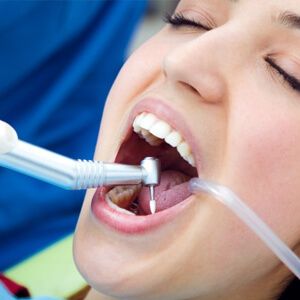 Girl getting dental treatment